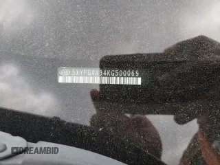 2019 Kia Sorento L z VIN 5XYPG4A34KG500069, wystawiony jako Copart lot #52714105 z przebiegiem 237 472 mil mil oraz Szkoda całkowita • Salvage title. Historia ofert i sprzedaży dostępna na DreamBid. Obrazek 13.