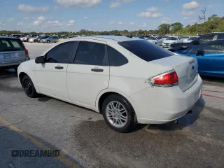 2010 Ford Focus SE with VIN 1FAHP3FN1AW168723, listed as a Copart auction lot 53871655 with 226,703 mi miles and Salvage Title. Bid and sale history available at DreamBid. Image 2.