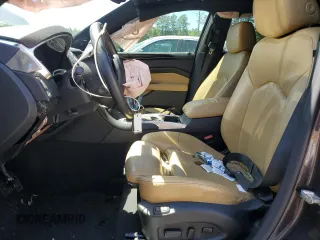 2015 Cadillac SRX Luxury Collection z VIN 3GYFNBE36FS606313, wystawiony jako Copart lot #52767735 z przebiegiem 91 480 mil mil oraz Szkody całkowita. Historia ofert i sprzedaży dostępna na DreamBid. Obrazek 7.