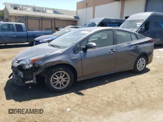 2022 Toyota Prius L Eco with VIN JTDKAMFUXN3174168, listed as a Copart auction lot 61052455 with 54,547 mi miles and Salvage title. Bid and sale history available at DreamBid. Image 1.