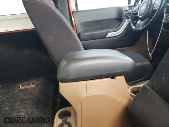 2014 Jeep Wrangler Rubicon with VIN 1C4BJWCG2EL303420, listed as a Copart auction lot 63550985 with 87,175 mi miles and Salvage title. Bid and sale history available at DreamBid. Image 11.