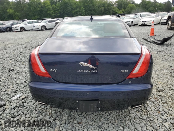 2017 Jaguar XJ R-Sport with VIN SAJWA1C70H8W05558, listed as a Copart auction lot 59759165 with 102,230 mi miles and Salvage title. Bid and sale history available at DreamBid. Image 6.