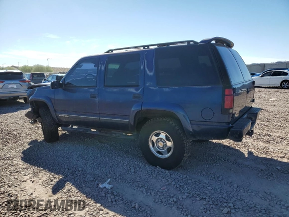 2000 Chevrolet Tahoe Z71 with VIN 1GNEK13R7YR152646, listed as a Copart auction lot 79464414 with 199,966 mi miles and Salvage title. Bid and sale history available at DreamBid. Image 2.