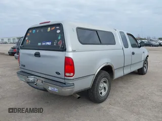 1999 Ford F-150 with VIN 1FTZX1720XKA10512, listed as a IAAI auction lot 41247083 with 169,154 mi miles and . Bid and sale history available at DreamBid. Image 4.