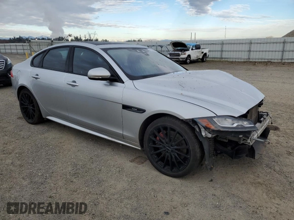 2016 Jaguar XF with VIN SAJBL4BV6GCY16964, listed as a Copart auction lot 82786584 with 100,587 mi miles and Salvage Title. Bid and sale history available at DreamBid. Image 4.