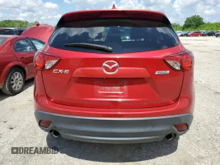 2016 Mazda CX-5 Touring with VIN JM3KE2CY0G0627886, listed as a Copart auction lot 55207054 with 95,884 mi miles and Salvage Title. Bid and sale history available at carsss.com. Image 6.
