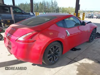 2016 Nissan 370Z with VIN JN1AZ4EH6GM931396, listed as a IAAI auction lot 42034122 with 16,477 mi miles. Bid and sale history available at carsss.com. Image 4.