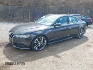 2016 Audi A6 2.0T Premium Plus with VIN WAUGFAFC7GN095669, listed as a IAAI auction lot 41894313 with 84,725 mi miles. Bid and sale history available at carsss.com. Image 2.