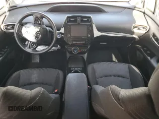 2020 Toyota Prius LE z VIN JTDKARFP5L3158691, wystawiony jako Copart lot #55255125 z przebiegiem Nie podano mil oraz Szkoda całkowita • Salvage title. Historia ofert i sprzedaży dostępna na DreamBid. Obrazek 8.