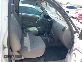 2002 Toyota Tacoma z VIN 5TENL42N62Z033844, wystawiony jako IAAI lot #42403317 z przebiegiem 130 961 mil mil oraz . Historia ofert i sprzedaży dostępna na DreamBid. Obrazek 5.