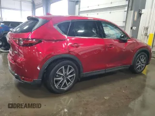 2018 Mazda CX-5 Grand Touring with VIN JM3KFBDM5J0454026, listed as a Copart auction lot 60672315 with 12,292 mi miles and Salvage title. Bid and sale history available at DreamBid. Image 3.