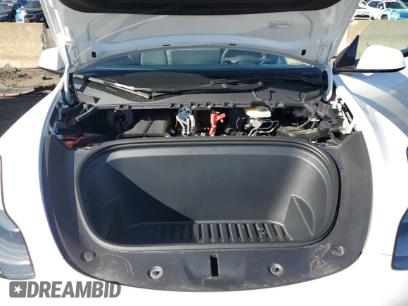 2024 Tesla Model Y with VIN 7SAYGDED9RF094494, listed as a Copart auction lot 50298115 with 7,858 mi miles and Salvage Title. Bid and sale history available at DreamBid. Image 11.