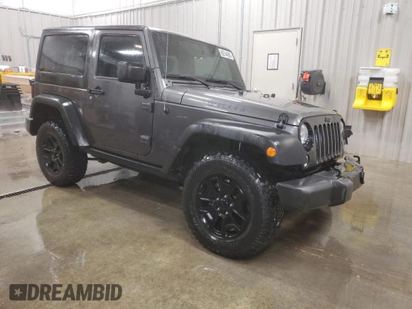 2017 Jeep Wrangler Willys Wheeler with VIN 1C4AJWAG9HL696710, listed as a Copart auction lot 88744905 with 66,800 mi miles and Salvage Title. Bid and sale history available at DreamBid. Image 4.