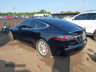2018 Tesla Model S 75D with VIN 5YJSA1E45JF269282, listed as a IAAI auction lot 42404695 with 251,795 mi miles and . Bid and sale history available at DreamBid. Image 3.