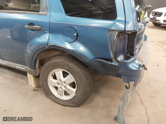 2009 Ford Escape XLT with VIN 1FMCU93G99KB70918, listed as a IAAI auction lot 41942399 with 141,158 mi miles. Bid and sale history available at carsss.com. Image 6.