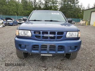2002 Isuzu Rodeo S with VIN 4S2CK58W124301647, listed as a Copart auction lot 56973895 with 129,009 mi miles and Salvage title. Bid and sale history available at DreamBid. Image 5.