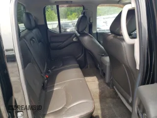2011 Nissan Frontier Pro-4X with VIN 1N6AD0EV8BC451995, listed as a Copart auction lot 60950855 with 102,360 mi miles and Clean title. Bid and sale history available at DreamBid. Image 10.