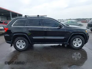 2012 Jeep Grand Cherokee Laredo with VIN 1C4RJEAG2CC259279, listed as a IAAI auction lot 41768024 with 185,161 mi miles. Bid and sale history available at carsss.com. Image 14.