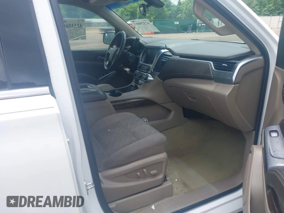 2017 Chevrolet Tahoe LS with VIN 1GNSCAKC7HR342637, listed as a IAAI auction lot 42335097 with 149,736 mi miles and . Bid and sale history available at DreamBid. Image 5.
