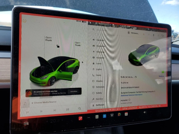 2023 Tesla Model 3 with VIN 5YJ3E1EAXPF708001, listed as a Copart auction lot 57252735 with 71,579 mi miles and Salvage title. Bid and sale history available at DreamBid. Image 9.