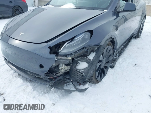 2023 Tesla Model Y Performance with VIN 7SAYGDEF0PF898181, listed as a IAAI auction lot 41577666 with 19,051 mi miles and . Bid and sale history available at DreamBid. Image 6.