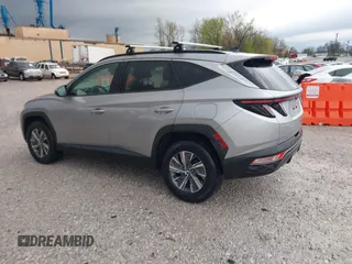 2022 Hyundai Tucson Blue z VIN KM8JBCA13NU077934, wystawiony jako IAAI lot #41920832 z przebiegiem 59 579 mil mil oraz . Historia ofert i sprzedaży dostępna na DreamBid. Obrazek 3.