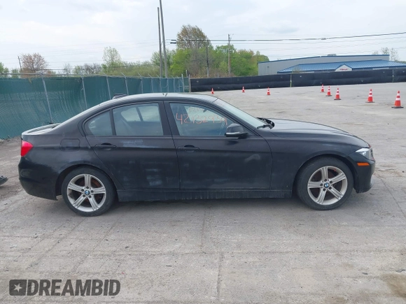 2015 BMW 3 Series 328i with VIN WBA3A5G57FNS87368, listed as a IAAI auction lot 42132939 with 115,289 mi miles. Bid and sale history available at carsss.com. Image 13.