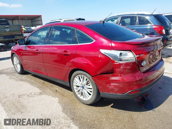 2015 Ford Focus Titanium with VIN 1FADP3J29FL230664, listed as a IAAI auction lot 41870083 with 125,578 mi miles and . Bid and sale history available at DreamBid. Image 3.