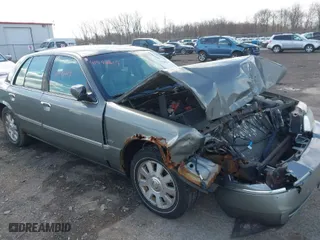 2003 Mercury Grand Marquis LS Premium with VIN 2MEHM75W53X655031, listed as a IAAI auction lot 41948619 with 162,030 mi miles. Bid and sale history available at carsss.com. Image 1.