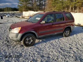 2002 Honda CR-V LX z VIN JHLRD68472C003956, wystawiony jako Copart lot #56356045 z przebiegiem 215 099 mil mil oraz Czysty tytuł • Clean title. Historia ofert i sprzedaży dostępna na DreamBid. Obrazek 1.