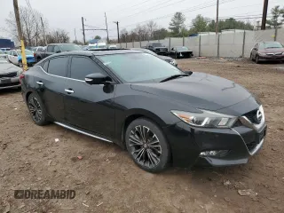 2016 Nissan Maxima SL with VIN 1N4AA6AP3GC436677, listed as a Copart auction lot 49880185 with 128,748 mi miles and Salvage Title. Bid and sale history available at DreamBid. Image 4.