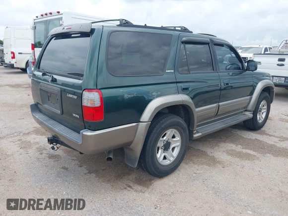 2000 Toyota 4Runner Limited with VIN JT3GN87RXY0163743, listed as a IAAI auction lot 42142809 with 185,320 mi miles and . Bid and sale history available at DreamBid. Image 4.