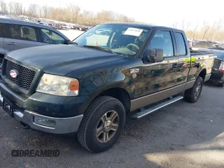 2005 Ford F-150 XLT with VIN 1FTPX14505FB72622, listed as a IAAI auction lot 41823532 with 165,918 mi miles. Bid and sale history available at carsss.com. Image 2.