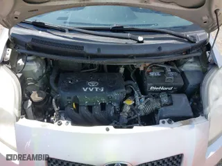 2007 Toyota Yaris with VIN JTDJT923475077877, listed as a IAAI auction lot 42073834 with 210,145 mi miles. Bid and sale history available at carsss.com. Image 10.