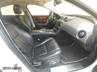 2013 Jaguar XJ with VIN SAJWJ1CD7D8V49599, listed as a Copart auction lot 54008915 with 133,163 mi miles and Clean Title. Bid and sale history available at carsss.com. Image 5.