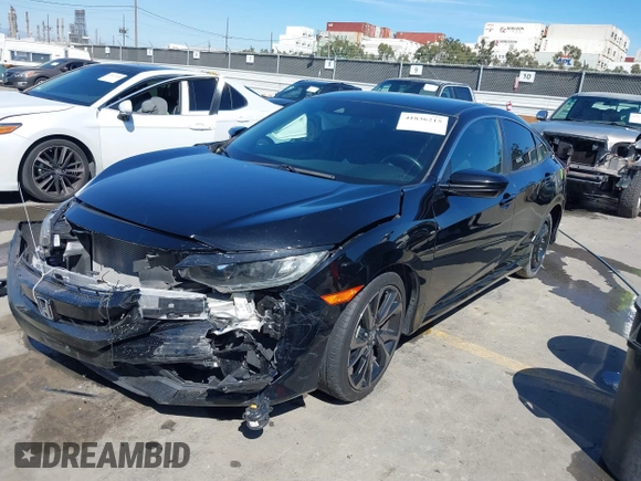 2021 Honda Civic Sport with VIN 2HGFC2F81MH529499, listed as a IAAI auction lot 41836215 with 55,833 mi miles and . Bid and sale history available at DreamBid. Image 17.