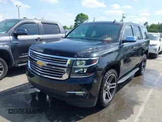2017 Chevrolet Tahoe Premier z VIN 1GNSCCKC9HR229204, wystawiony jako IAAI lot #42066553 z przebiegiem 138 561 mil mil oraz . Historia ofert i sprzedaży dostępna na DreamBid. Obrazek 2.