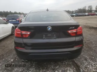 2015 BMW X4 xDrive28i with VIN 5UXXW3C55F0M88228, listed as a Copart auction lot 82940173 with 73,519 mi miles. Bid and sale history available at carsss.com. Image 6.