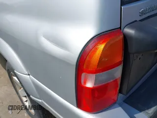 2003 Suzuki XL7 Touring z VIN JS3TY92V934101118, wystawiony jako IAAI lot #42425129 z przebiegiem 175 455 mil mil oraz . Historia ofert i sprzedaży dostępna na DreamBid. Obrazek 12.