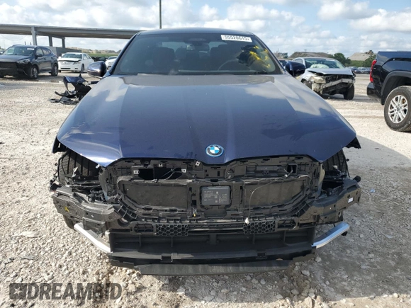 2024 BMW i5 eDrive40 with VIN WBY33FK09RCR50159, listed as a Copart auction lot 55520615 with 12,564 mi miles and Salvage title. Bid and sale history available at DreamBid. Image 5.
