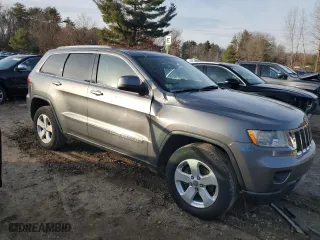 2011 Jeep Grand Cherokee Laredo with VIN 1J4RR4GG7BC735884, listed as a Copart auction lot 85525744 with 117,637 mi miles and Clean Title. Bid and sale history available at carsss.com. Image 4.