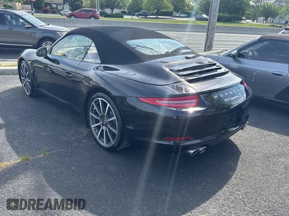 2013 Porsche 911 Carrera S with VIN WP0CB2A97DS154165, listed as a Copart auction lot 56958415 with 99,999 mi miles and Salvage Title. Bid and sale history available at DreamBid. Image 3.