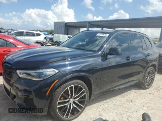 2023 BMW X5 M50i z VIN 5UXJU4C09P9P94657, wystawiony jako Copart lot #50709685 z przebiegiem Nie podano mil oraz Szkoda całkowita • Salvage title. Historia ofert i sprzedaży dostępna na DreamBid. Obrazek 1.