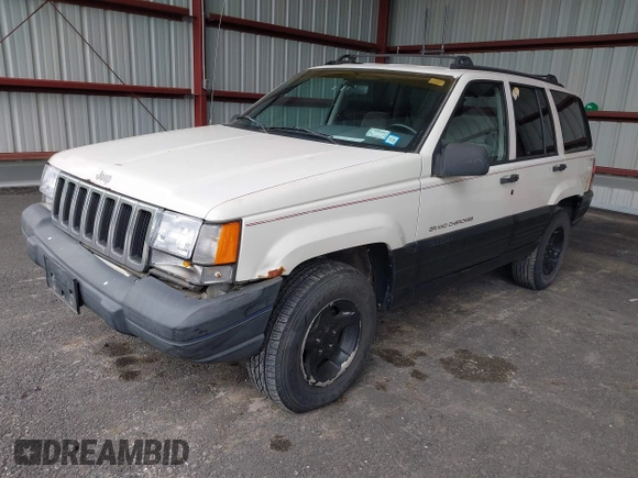 1997 Jeep Grand Cherokee Laredo z VIN 1J4GZ58S7VC737980, wystawiony jako IAAI lot #42256142 z przebiegiem 188 958 mil mil oraz . Historia ofert i sprzedaży dostępna na DreamBid. Obrazek 2.