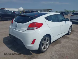 2014 Hyundai Veloster RE:FLEX z VIN KMHTC6AD5EU201168, wystawiony jako IAAI lot #41930766 z przebiegiem 198 909 mil mil oraz . Historia ofert i sprzedaży dostępna na DreamBid. Obrazek 4.