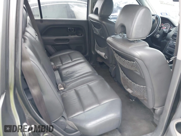 2007 Honda Pilot EX-L with VIN 5FNYF18697B002843, listed as a IAAI auction lot 41549328 with 202,365 mi miles and . Bid and sale history available at DreamBid. Image 8.