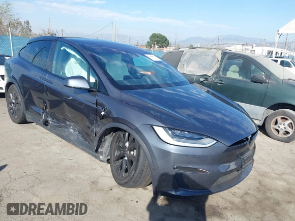 2023 Tesla Model X with VIN 7SAXCBE50PF378548, listed as a IAAI auction lot 41698357 with Not Provided miles and . Bid and sale history available at DreamBid. Image 1.