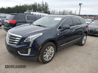 2017 Cadillac XT5 FWD with VIN 1GYKNARS2HZ188557, listed as a IAAI auction lot 41840764 with 104,524 mi miles. Bid and sale history available at carsss.com. Image 17.