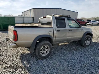 2000 Nissan Frontier XE with VIN 1N6ED27T8YC393355, listed as a Copart auction lot 49607575 with 241,813 mi miles and Salvage title. Bid and sale history available at DreamBid. Image 3.