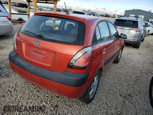 2009 Kia Rio LX with VIN KNADE243X96587429, listed as a Copart auction lot 46500825 with 116,557 mi miles and Salvage Title. Bid and sale history available at carsss.com. Image 3.